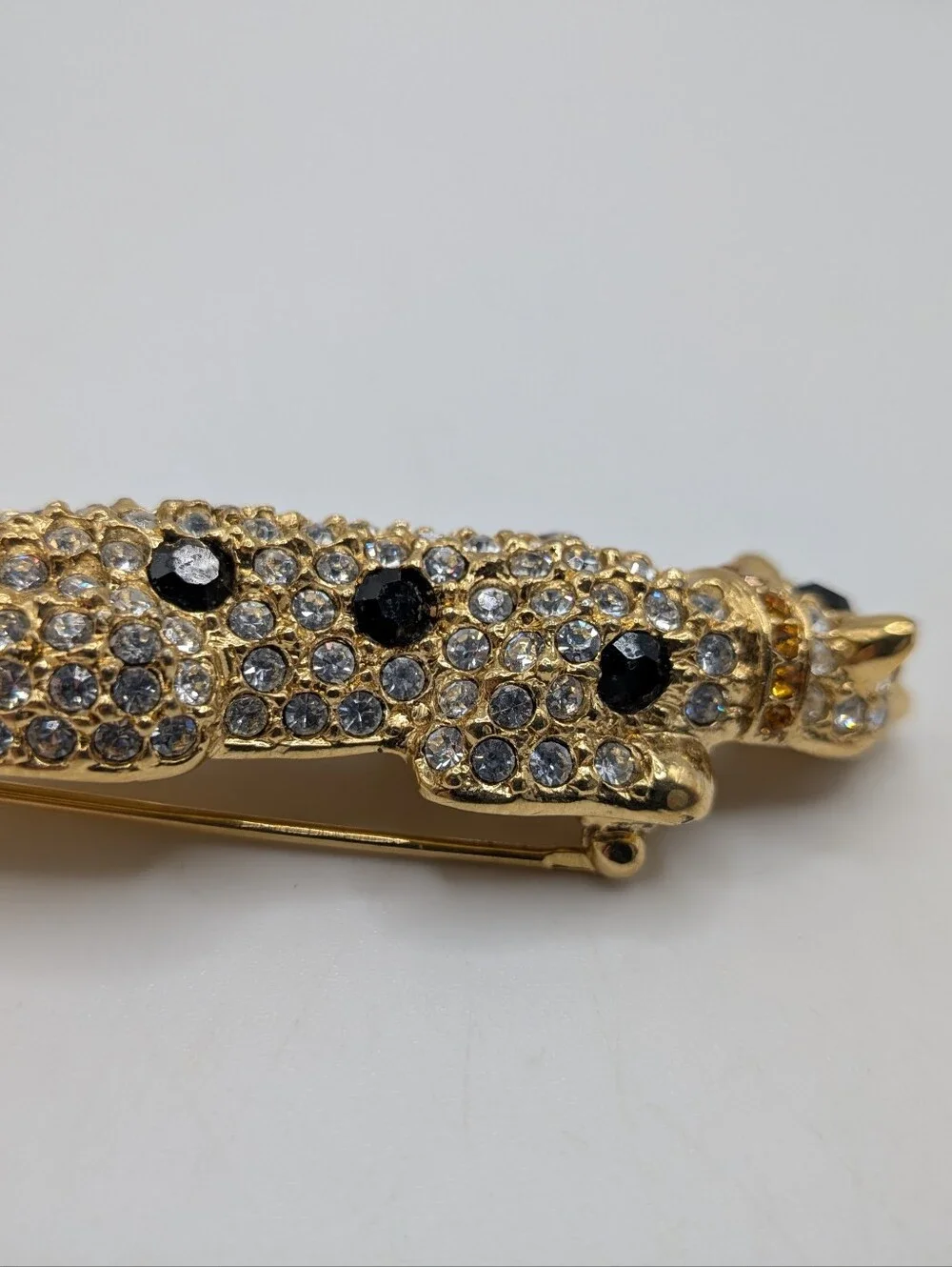 Giorgio Gold-Tone Leopard Brooch with Green and Black Stones